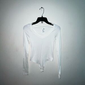 White long sleeved bodysuit